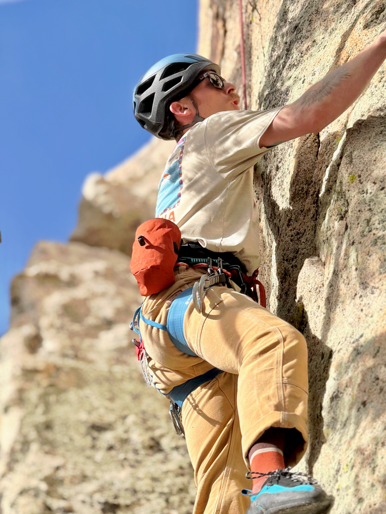 Brad Adams on a newly bolted route at the Coven in Fawnskin.